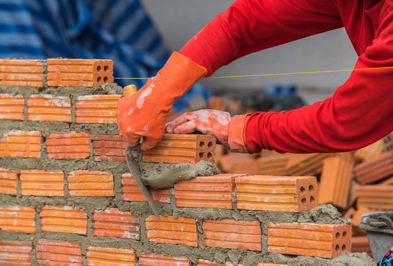 Кладка кирпичных стен: технологии, раствор, армирование